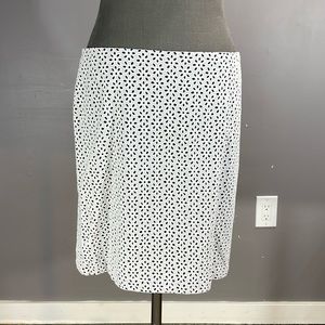 Beautiful eyelet skirt in navy and white.  Fits aprox. Size 14